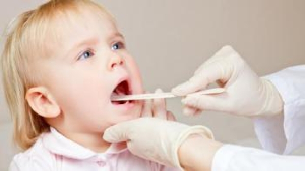 At what age should my child have tonsil and adenoid surgery?